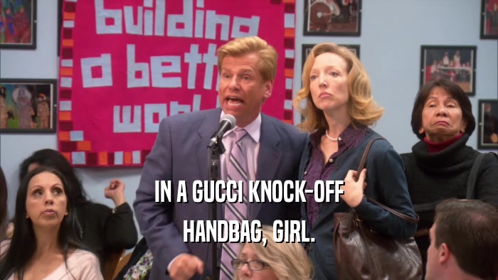 IN A GUCCI KNOCK-OFF HANDBAG, GIRL. 
