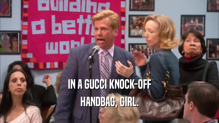 IN A GUCCI KNOCK-OFF HANDBAG, GIRL. 