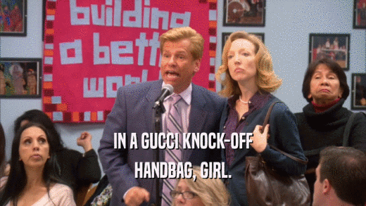 IN A GUCCI KNOCK-OFF HANDBAG, GIRL. 