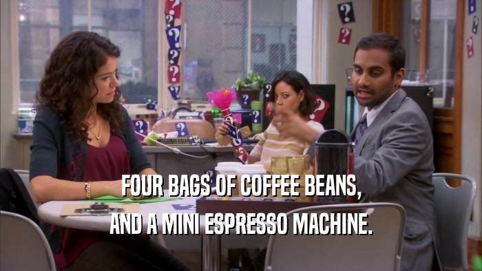 FOUR BAGS OF COFFEE BEANS, AND A MINI ESPRESSO MACHINE. 