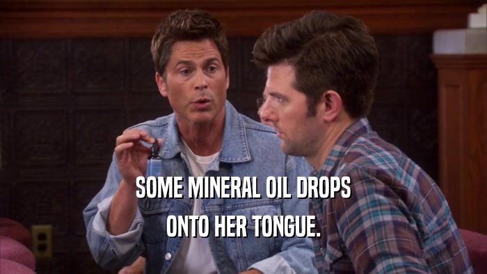 SOME MINERAL OIL DROPS ONTO HER TONGUE. 