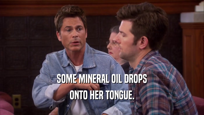 SOME MINERAL OIL DROPS ONTO HER TONGUE. 