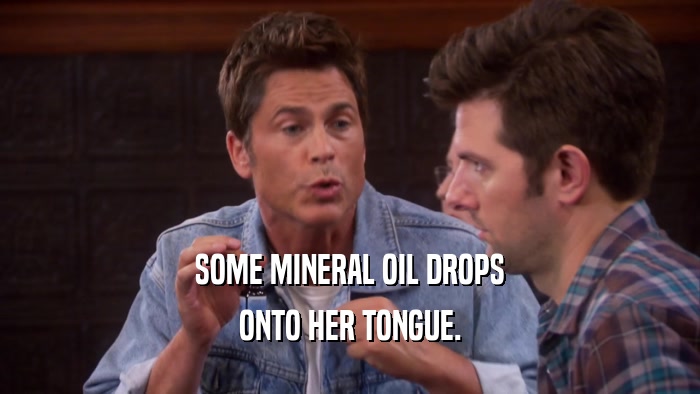 SOME MINERAL OIL DROPS ONTO HER TONGUE. 