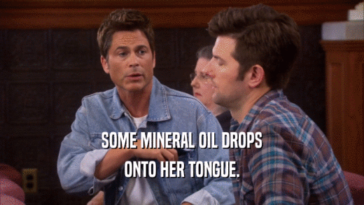 SOME MINERAL OIL DROPS ONTO HER TONGUE. 