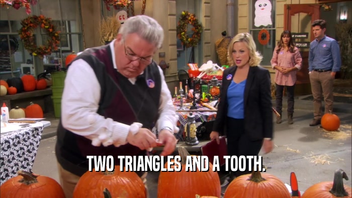 TWO TRIANGLES AND A TOOTH.  