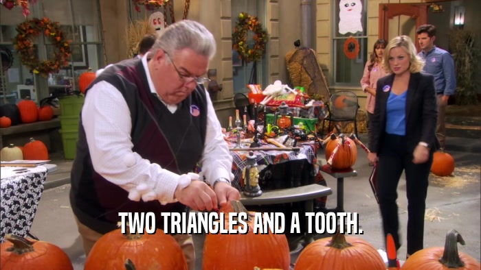 TWO TRIANGLES AND A TOOTH.  