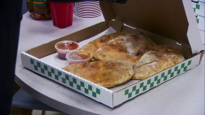 WAIT A SECOND. THAT'S NOT PIZZA. THOSE ARE CALZONES! 