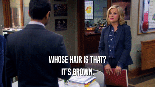 WHOSE HAIR IS THAT? IT'S BROWN. 