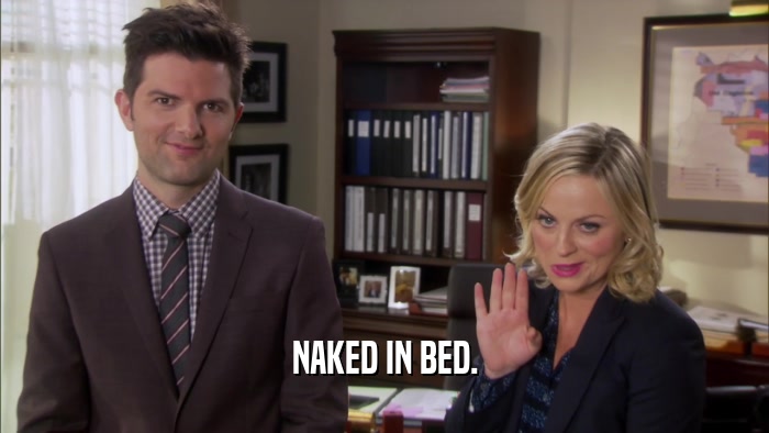 NAKED IN BED.  