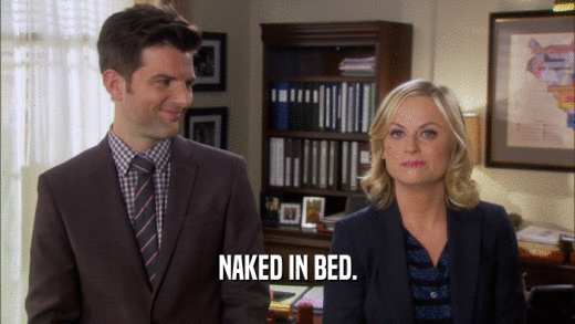 NAKED IN BED.  