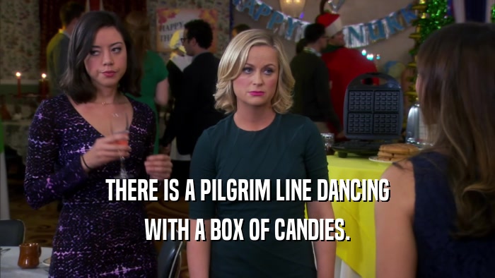 THERE IS A PILGRIM LINE DANCING WITH A BOX OF CANDIES. 
