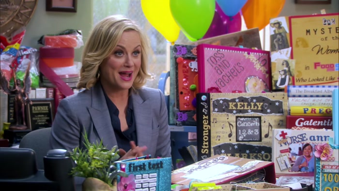 IT TAKES 103 SCRAPBOOKS TO CAPTURE IT. 