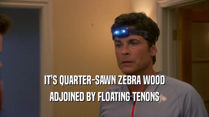 IT'S QUARTER-SAWN ZEBRA WOOD ADJOINED BY FLOATING TENONS 