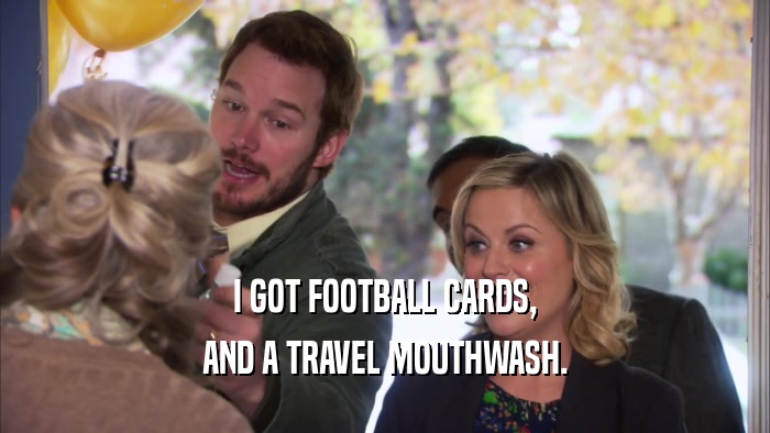 I GOT FOOTBALL CARDS, AND A TRAVEL MOUTHWASH. 