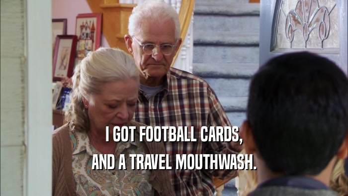 I GOT FOOTBALL CARDS, AND A TRAVEL MOUTHWASH. 
