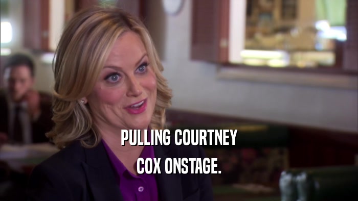 PULLING COURTNEY COX ONSTAGE. 