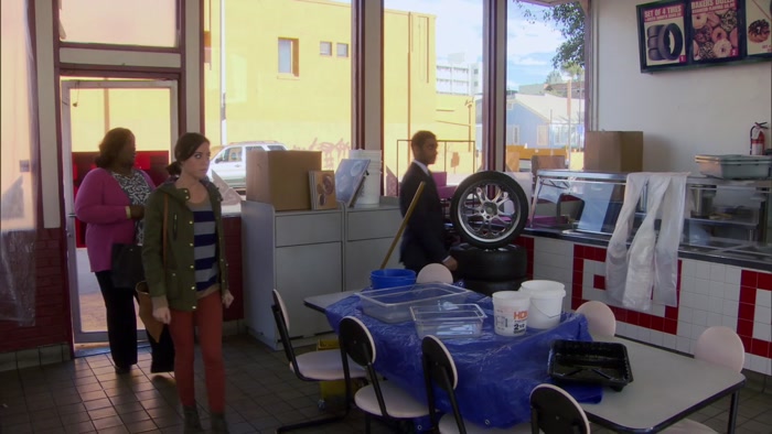 USED TO BE A DONUT SHOP. WELL, A TIRE SHOP THAT SOLD DONUTS. 