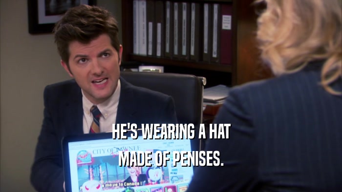 HE'S WEARING A HAT MADE OF PENISES. 