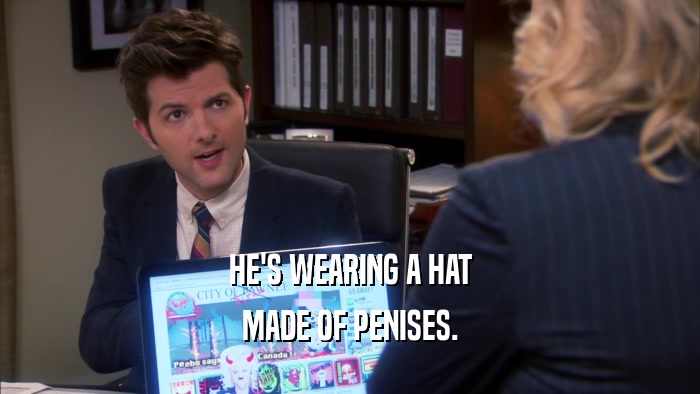 HE'S WEARING A HAT MADE OF PENISES. 