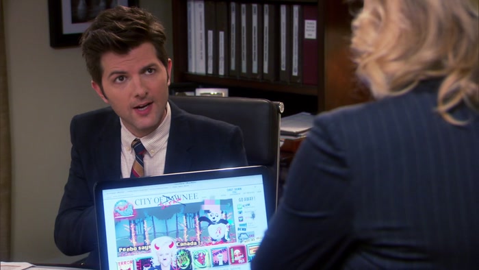 HE'S WEARING A HAT MADE OF PENISES. 