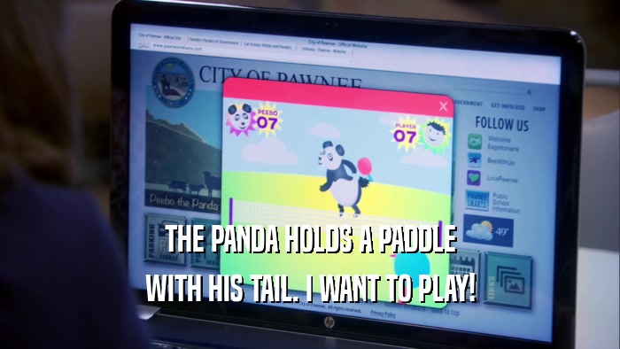 THE PANDA HOLDS A PADDLE WITH HIS TAIL. I WANT TO PLAY! 