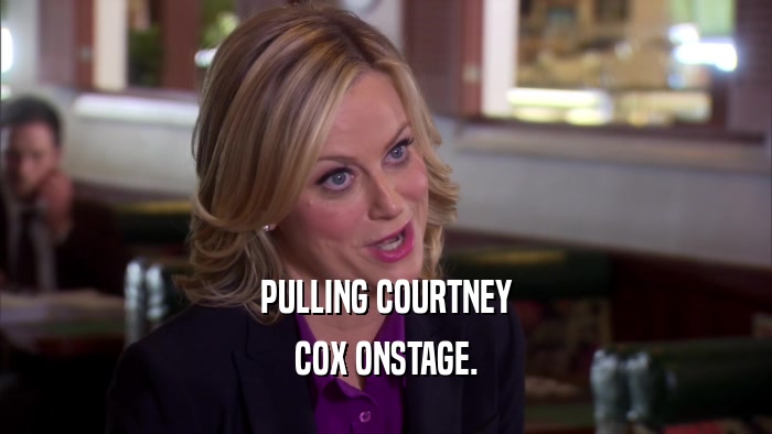 PULLING COURTNEY COX ONSTAGE. 