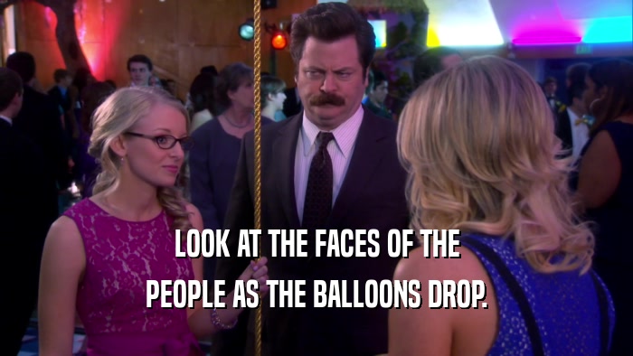 LOOK AT THE FACES OF THE PEOPLE AS THE BALLOONS DROP. 
