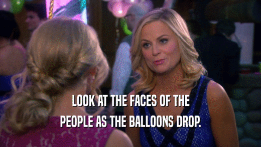 LOOK AT THE FACES OF THE PEOPLE AS THE BALLOONS DROP. 