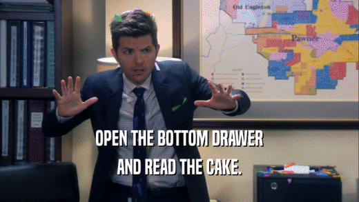 OPEN THE BOTTOM DRAWER AND READ THE CAKE. 