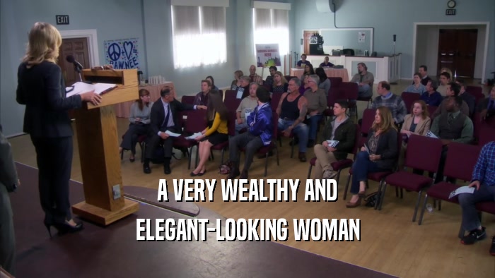 A VERY WEALTHY AND ELEGANT-LOOKING WOMAN 