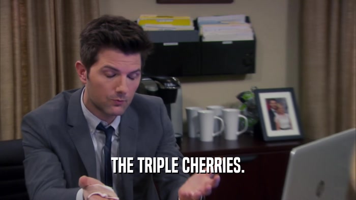 THE TRIPLE CHERRIES.  