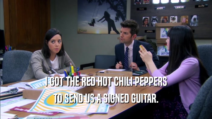 I GOT THE RED HOT CHILI PEPPERS TO SEND US A SIGNED GUITAR. 