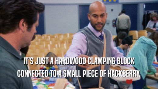 IT'S JUST A HARDWOOD CLAMPING BLOCK CONNECTED TO A SMALL PIECE OF HACKBERRY. 