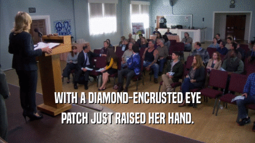 WITH A DIAMOND-ENCRUSTED EYE PATCH JUST RAISED HER HAND. 