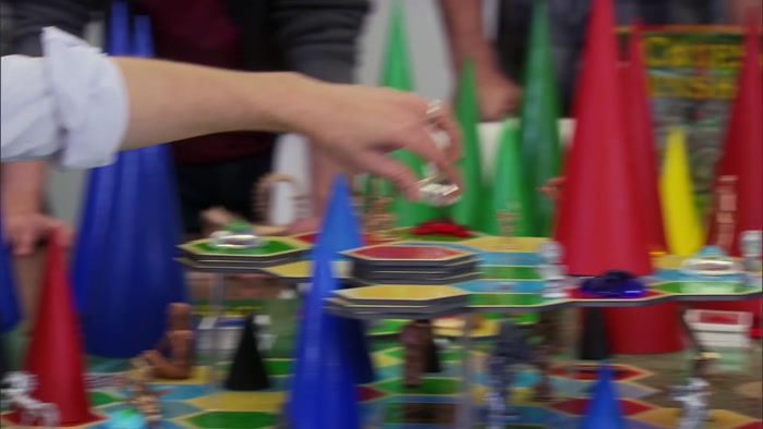 PLAY AN ACTION CARD, BUILD A BELL TOWER INSIDE YOUR CITADEL. 