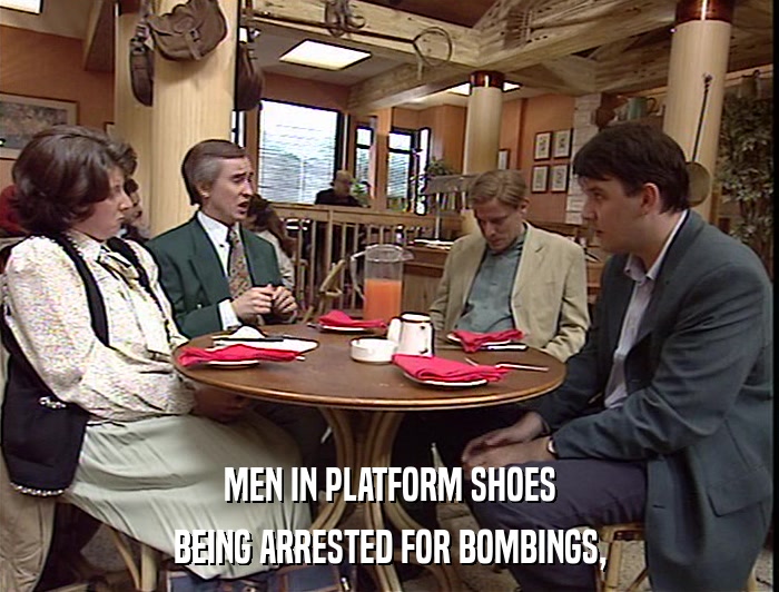 MEN IN PLATFORM SHOES BEING ARRESTED FOR BOMBINGS, 