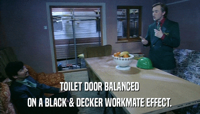 TOILET DOOR BALANCED ON A BLACK & DECKER WORKMATE EFFECT. 