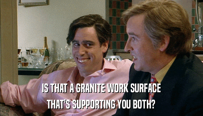 IS THAT A GRANITE WORK SURFACE THAT'S SUPPORTING YOU BOTH? 
