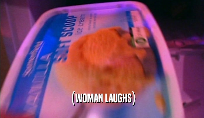 (WOMAN LAUGHS)  