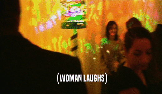 (WOMAN LAUGHS)  