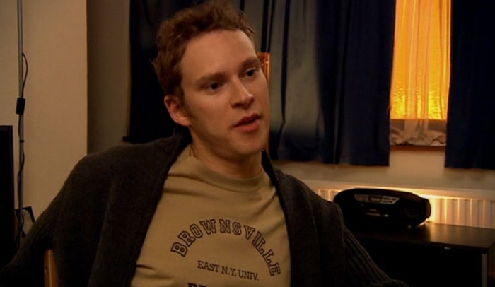 DON'T TELL ME THAT BLAIR WEARS A SUIT WHEN HE'S AT HOME WATCHING BIG BROTHER. 