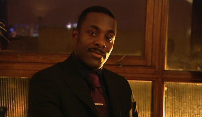 DON'T TELL ME THAT BLAIR WEARS A SUIT WHEN HE'S AT HOME WATCHING BIG BROTHER. 