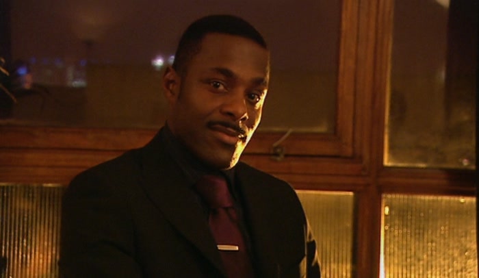 DON'T TELL ME THAT BLAIR WEARS A SUIT WHEN HE'S AT HOME WATCHING BIG BROTHER. 