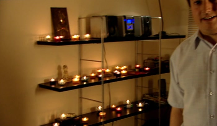 WOW! THIS IS A LOT OF CANDLES. IT'S ACTUALLY GETTING PRETTY HOT IN HERE. 