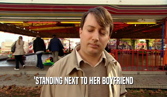 'STANDING NEXT TO HER BOYFRIEND  