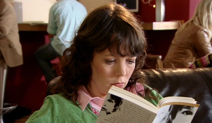 'A PROPER GIRLFRIEND, READING A
 BESTSELLER ABOUT CHILD ABUSE.
 