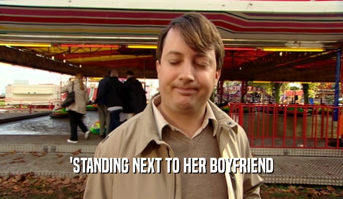 'STANDING NEXT TO HER BOYFRIEND  