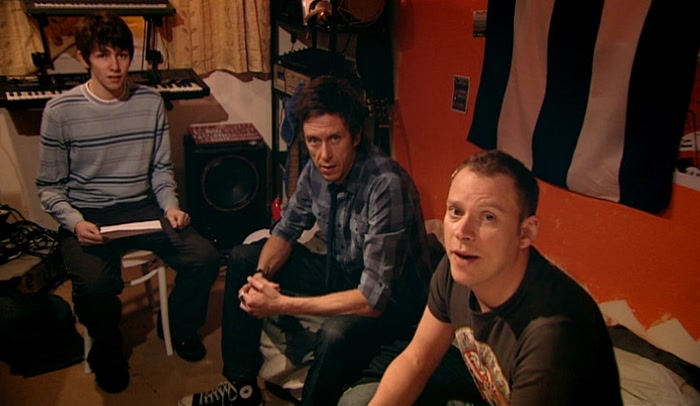BARNEY'S STAYING OVER FOR A BIT. HE'S JOINED THE BAND. 