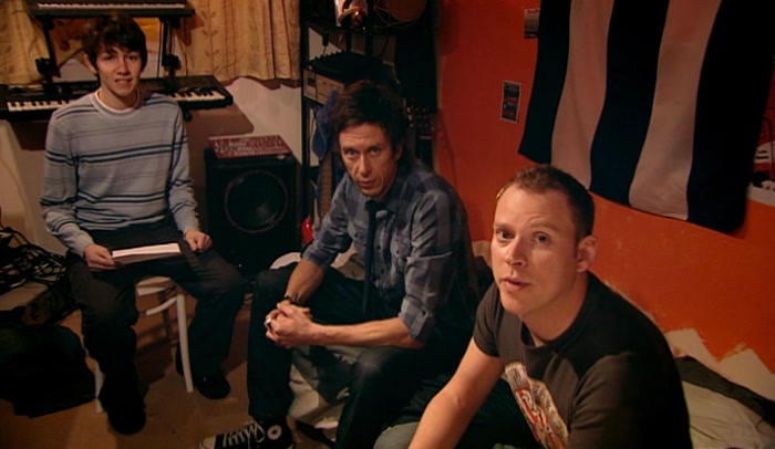 BARNEY'S STAYING OVER FOR A BIT. HE'S JOINED THE BAND. 