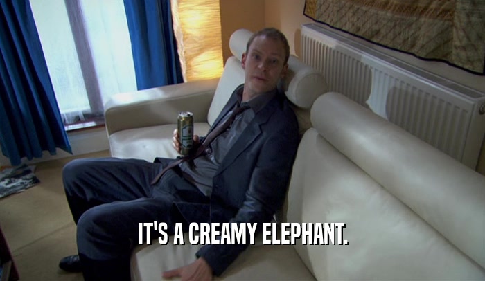 IT'S A CREAMY ELEPHANT.  